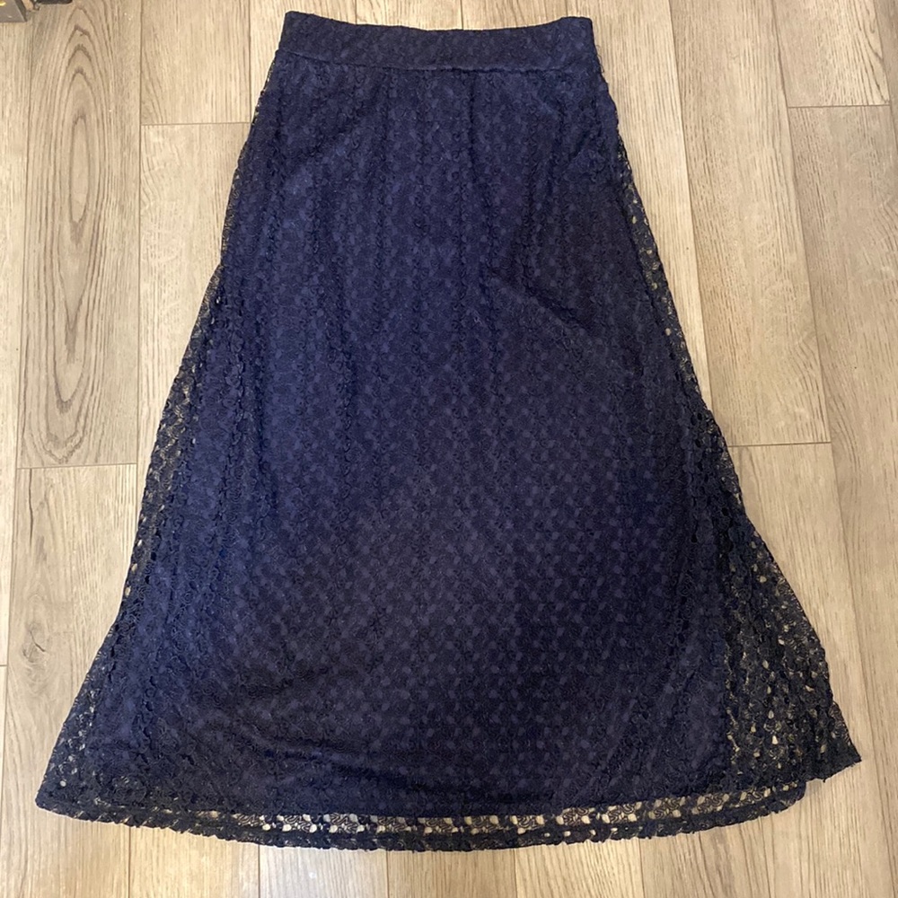 Woman’s navy lace skirt